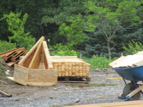 A mocked-up model of the jack rafter and hip assembly sits on the ground at the Auburndale Builders job site in Wayland, Massachusetts.