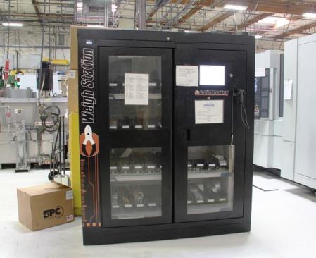 This is an automated tool crib. Workers access hand tools by swiping their badge with a scanner: The doors open and the worker takes what he or she needs. The crib contains software that tracks what was taken, when it was taken, and whether or not the person who borrowed it put it back. It can tell what was taken because it has a built-in scale and knows the weight of every tool it contains.