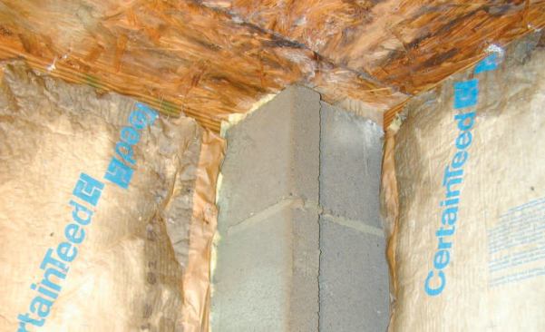 Moisture condensing on the cold masonry columns on the perimeter of the crawlspace was wicking into the adjacent cripple wall framing and insulation batts.