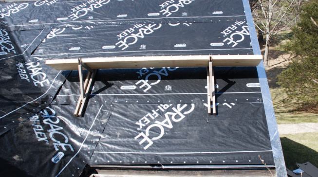 I then cover the roof with a synthetic roofing underlayment.