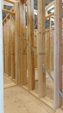 A combination of practical training and in-class instruction fills the seven weeks of each level. Here cross-bracing keeps the unsheathed walls square.