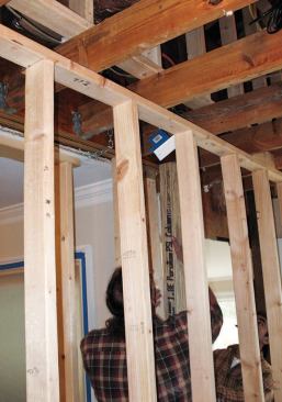 Each end of the beam was supported by a 4-inch-by-6-inch Parallam column.