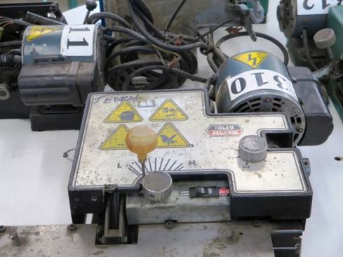 Teeth are cut into handsaw blades using one of several Foley Belsaw machines, each set to produce a particular tooth pattern.