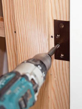 He drills a new hole with a vix bit.