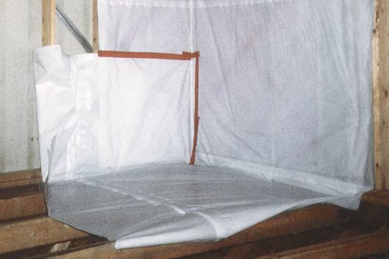 If a tub-shower unit is located against an exterior wall, fiberglass insulation and the poly air barrier need to be installed before the tub. All seams in the poly air barrier are taped with red contractor’s tape from 3M.
