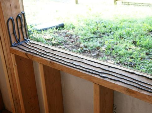 Apply it in a serpentine pattern a minimum of 6 inches up the jambs, then across the sill…