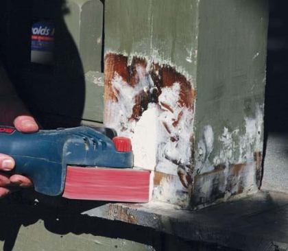 Specialty sanders, like this Bosch compact belt sander, are indispensable for finishing an epoxy patch.