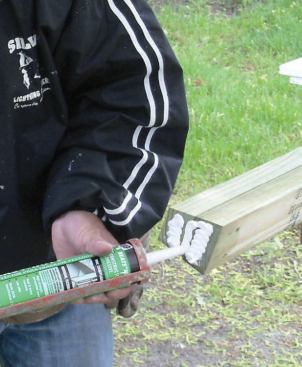 Assembly: I predrilled holes for long timber screws, then applied adhesive.