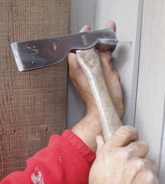 For handwork, they use siding hatchets, which are also helpful for sizing and trimming shingles.