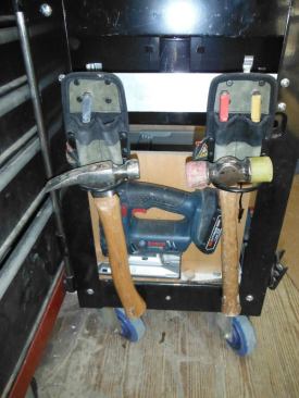 I use a hickory handle trim hammer because I prefer the feel of wood handles over fiberglass. Now that I specialize in installation work, I rarely pick up a regular hammer – at least not as often as I did doing general carpentry. In my work it’s important to have a rubber-headed mallet for tapping or hitting finish material that would be damaged by a regular hammer. Both tools are hung from Iron Dog hammer hangers, which have slots for pencils or nail sets.