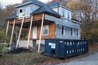 A view of the house with the front porch removed.