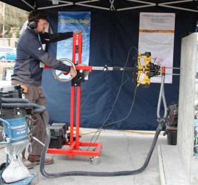 The ErgoMek Drill Boss is designed for the contractor who needs to drill a LOT of holes. Instead of holding the rotary hammer by hand, you mount it in the gizmo and then turn the crank.
Click here for more info and to see it in action.