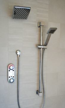 The multihead shower is operated by handheld remote control, so the user can turn it on without getting wet.