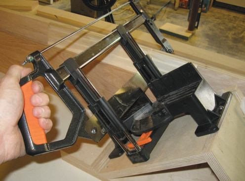 I used a Jorgensen "mini-precision" miter saw mounted on a 45-degree angle block.