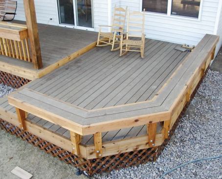 Although this bench seat is higher than 30 inches above grade, the deck's walking surface is not, so no guard is required.
