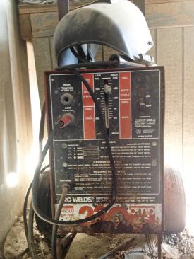 Stick welders are often used with thicker metals and for outdoor work. To protect the weld puddle from contaminants in the atmosphere, electrode rods are typically coated with a flux that creates a shielding gas when it burns. The author's vintage unit is slow but usable.