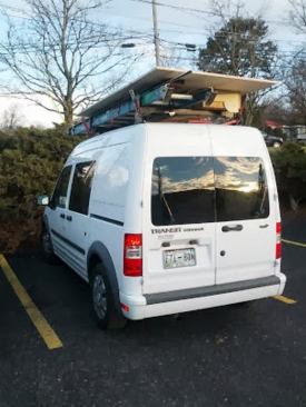 We've heard some of the good, but what about the limitations to this sort of setup? While I've successfully carried sheets of plywood or long bundles of trim on the roof rack, you're not going to be hauling a lot of material, and you're certainly not going to be towing. With its 2L 4-cylinder engine the Transit is doing well to get itself down the road. The interior is Spartan, and the handling and ride are not what you’d call plush. There is a fair amount of road noise in the cab, and it tends to vibrate annoyingly at stop lights. If you get one of these vehicles you’ll need to steer clear of drive-throughs and parking garages. Trust me on this one.
