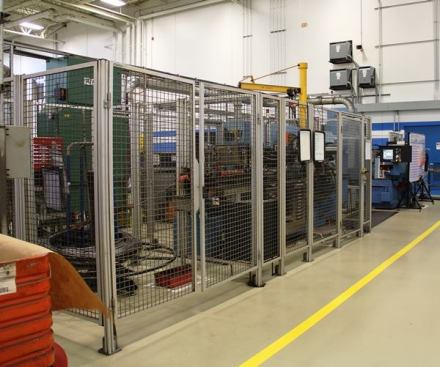 This is a production cell for Phillips screwdrivers. Once it’s set up and loaded with material it can run on its own. The machinery is fenced in for safety because there are a lot of rapidly moving parts that aren’t covered by housings.