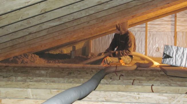 Attic ceiling areas were sheetrocked first to support the insulation. Attics received a 16-inch layer of loose-fill cellulose with an R-value of 65.
