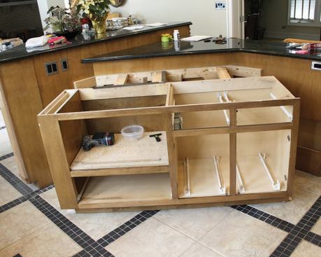 We repaired the mud bed with quick-setting cement, and used leftover tile to patch in the missing section.