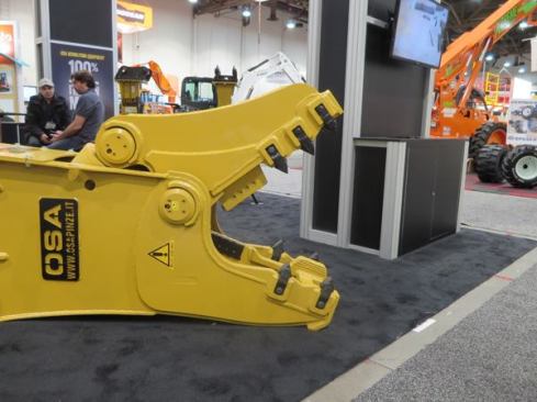 In spite of the teeth, this is not a dragon; it’s a hydraulic pulverizer used to demolish concrete.