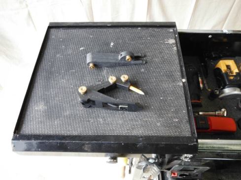 This is a great all around scriber with an articulating arm that allows you to scribe in locations where other scribes won’t reach. It has a retractable pin point that allows it to be used as dividers or a compass. The flat back allows you to do a more accurate scribe than can be accomplished with other tools. The built-in pencil sharpener is handy – though it doesn’t work particularly well.