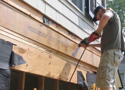 Because the fit was tight, we occasionally had to run our reciprocating saw in between the top of the microlam and the subfloor to gain an additional 1/8 inch of wiggle room.