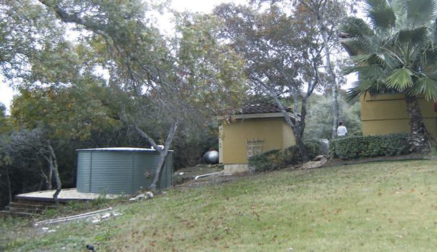 The tank can be located some distance from the house, as in the installation shown below.