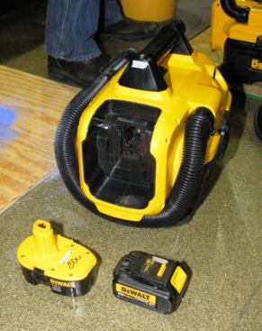 This is the DC (cordless only) version of DeWalt's new vac. Like the AC/DC (corded and cordless) model it can be powered by post style (XRP) battery packs and the newer (20V MAX) slide mount packs. The batteries fit into a recessed area on the side of the machine.