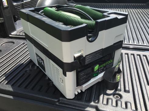 The Festool Dust Extractor CT SYS - 584174 is a full-featured portable dust extractor that is also HEPA-certified. It includes a removable hose and cord carriage, tool-triggered functionality, a shoulder strap, and Systainer integration. At $375, it's not the least expensive portable dust extractor on the market. But it is the smallest HEPA-certified vac on the market.