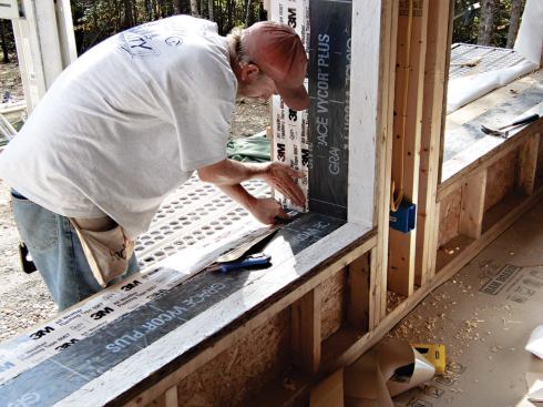 The window bucks were protected with flashing tape.