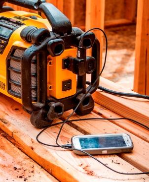 On the right side of the radio are two 110-volt receptacles and a wrap for the cord.