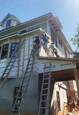 On the exterior, they created a rainscreen with 1x4 pressure-treated wood furring strips installed 16 inches on-center.