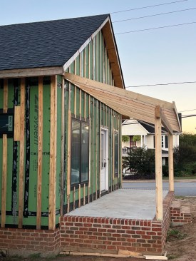 The homes at Duke Street Cottages included a rainscreen on top of SIPs.