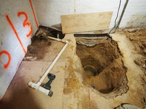 A new sump pit is roughed-in.