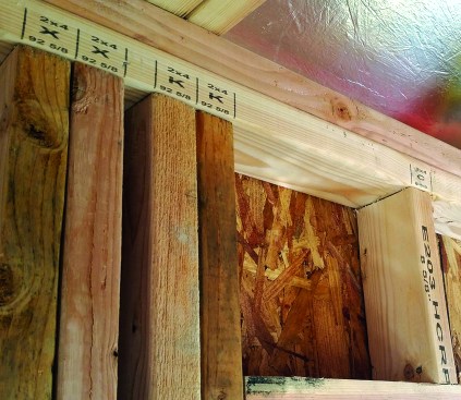 BMC’s ReadyFrame provides lumber packages with precut plates, jack studs, headers, and cripples. Plates come printed with each wall layout, so framers only have to grab precut studs from a pile and assemble the wall; no layout or cutting required.