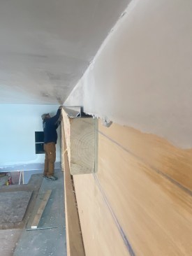 The plywood was replaced by a 2x4 for mounting the lighting track.