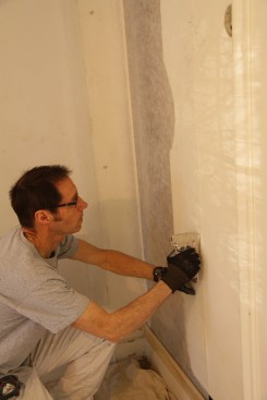 For the wall repair, I stapled the fabric over the opening in the wall.
