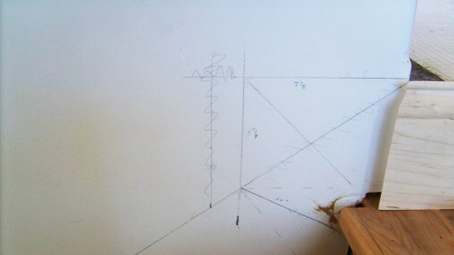 The layout shows how the author resolves a short wall run with a skirt that rises to meet a level baseboard.