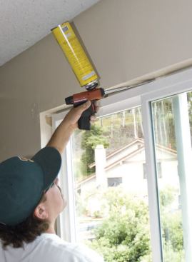 Low-expansion foam sprayed between the frame and the wall airseals the window.