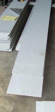 I measured and rough-cut the first few clapboards to length, offsetting them and cutting several at a time.