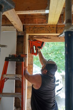 Flush beam. The other end of the new beam is supported by a new LVL header, which is supported by full length jacks on both sides of the window opening.