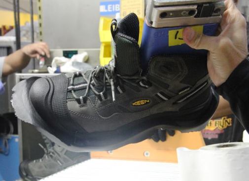 This steel toe Braddock low top just came out of the mold. The next step will be to trim off the excess material. You might think a robot could do it, but this is one process that’s best done by hand. A skilled human worker can eyeball the boot and know just how to make the cuts. A robot would have to be programmed for every size and type of boot. Supposedly, the people who trim off the excess material can look at a boot in a store and tell if they did it.