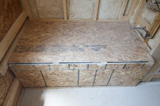 Finally a top sheet of OSB and this tub is fully protected for the duration of construction!