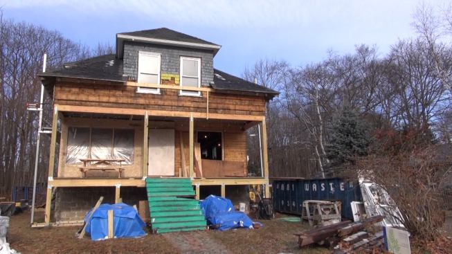 The 1918 island house served three-season and vacation purposes for decades, but the years took their toll. Now, the house is getting a complete makeover, including comprehensive structural reinforcement and a thorough above-code energy upgrade. Board sheating visible here will be retained, covered with air-tight impervious membrane, and over-insulated with three inches of high-density polyurethane foam.