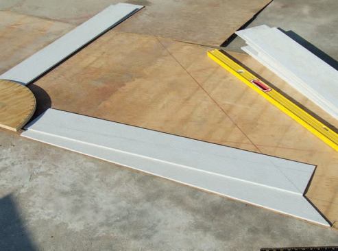 I then placed the tapered boards back on the full-scale layout and positioned the next pieces for scribing.