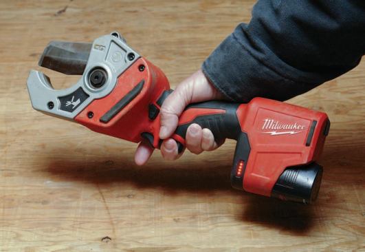 To cut, you push the lock-off button with the base of your forefinger while squeezing the rear trigger with your middle finger. This also lights up the LED battery gauge for about two seconds. Pulling the front trigger alone springs the blade open.