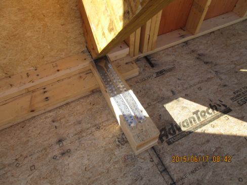 Another view of the connection at the foot of the site-built LVL truss that supports the building's main LVL roof ridge.