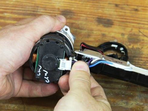 Unclip wiring harness from electronic controller.