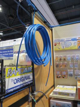 The 1/2- and 3/4-inch coiled pipe shown here is aluminum clad inside and out with HDPE (a type of plastic). It’s joined with metal fittings and is used in industrial systems. RapidAir also makes systems for home shop use. Their 100’ garage system uses nylon tubing and lists for about $139. Components can be purchased separately for all of their systems so kits can be customized or adapted to where they’re installed.